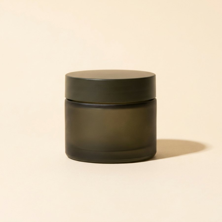 Reset Serum — dark frosted glass jar, full product