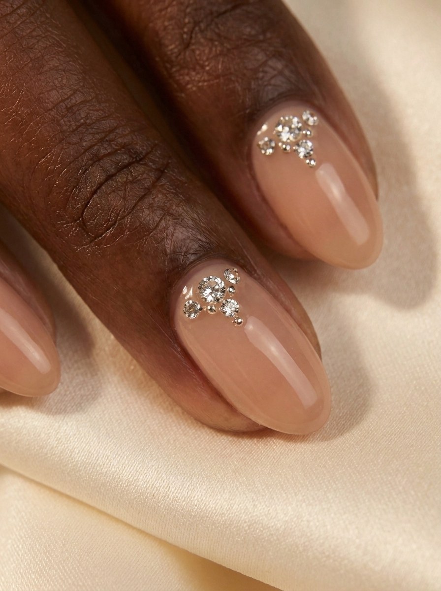 Moissanite stones applied to short nude nails